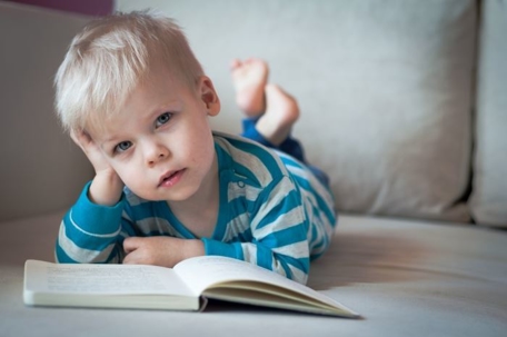 child reading book